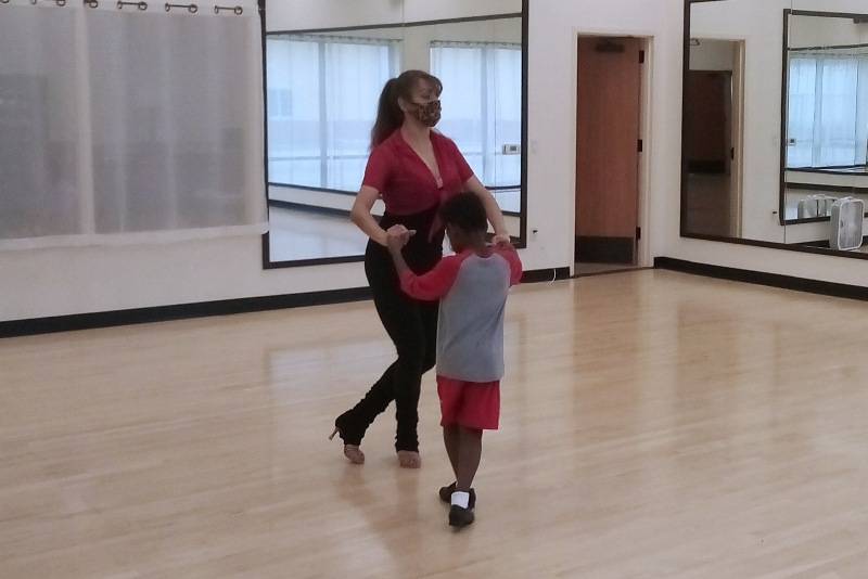 Young student learning to dance in a private dance lesson